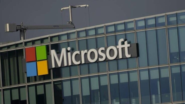 The logo of Microsoft is seen outside it's French headquarters in Issy-les-Moulineaux, outside Paris, on May 13, 2024